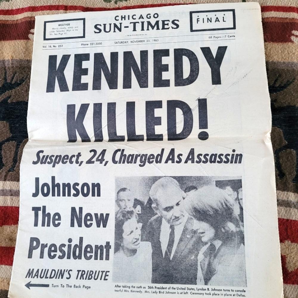 Historical reissued front page news from Chicago-Sun Times newspaper.